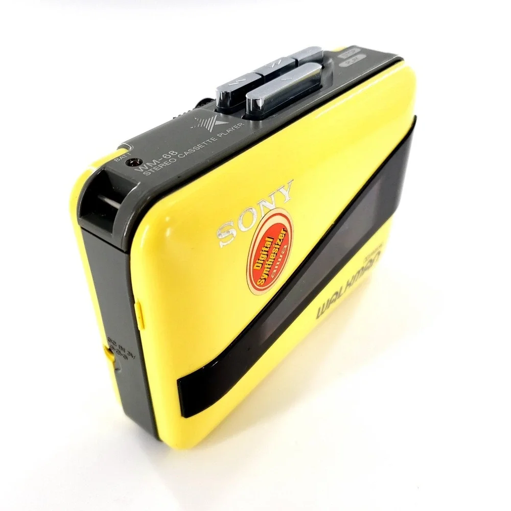 Sony Walkman WM-68 Stereo Cassette Player w/ Clip Yellow Brand New Belts Tested